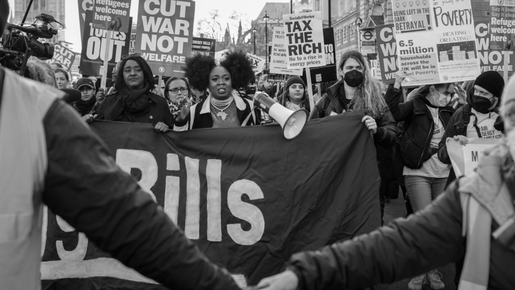 Protesters marching from Parliament Square along Whitehall towards Downing Street.